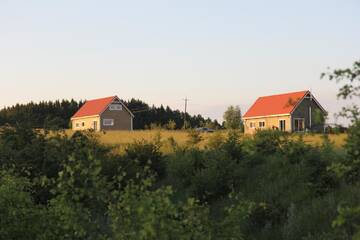 Фото номера Дом с 3 спальнями Дома для отпуска Mazury - Dom przy Cisowym Jarze г. Kowale Oleckie 8