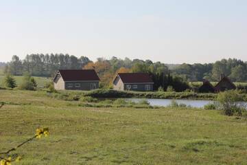 Фото номера Дом с 3 спальнями Дома для отпуска Mazury - Dom przy Cisowym Jarze г. Kowale Oleckie 33